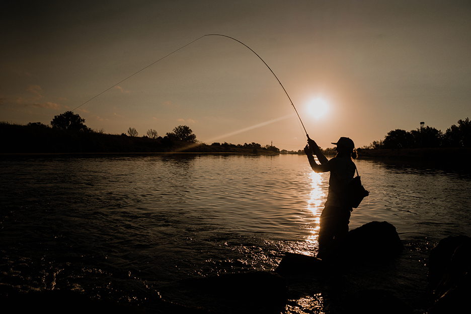 Fly fishing at sunset.